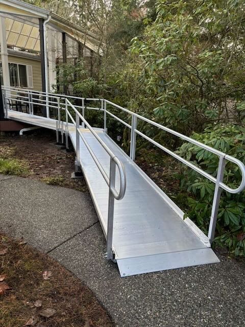 Completed ADA ramp with dual handrails